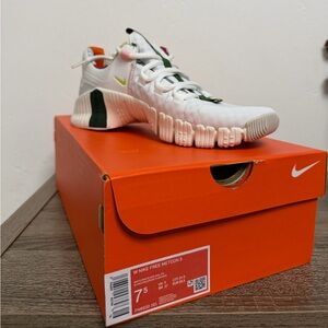 Nike Kids White Sneakers with Green Highlights